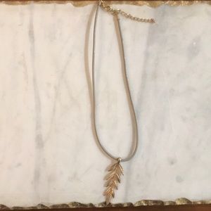 Gray leather necklace with gold drop leaf pendant